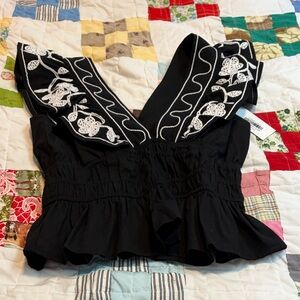 Elegant Black Blouse with White Embroidery